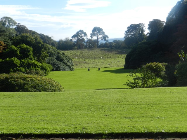 View over the lawn to Loch Ryan from Garden Cottage
